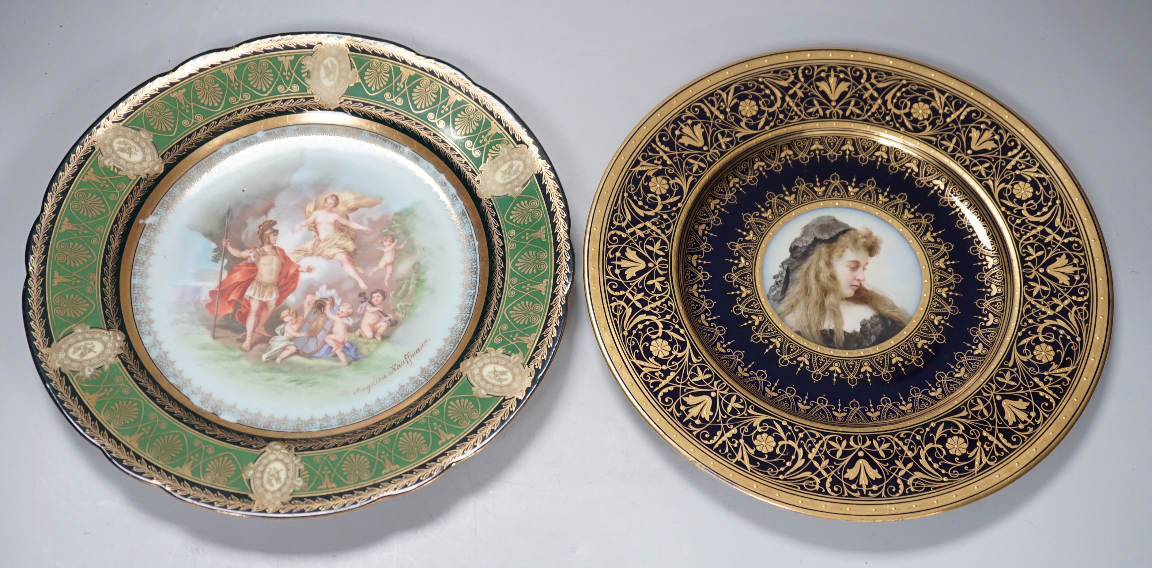 A Vienna style painted portrait plate, and another Vienna style plate both signed, largest 25cm diameter